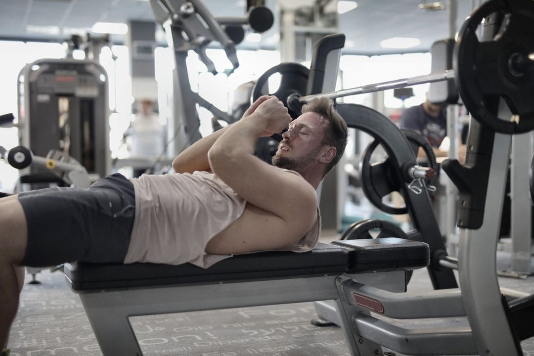 How Long Should You Actually Rest Between Sets? Most Men Get This Wrong